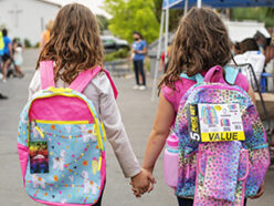 School girls with backpacks