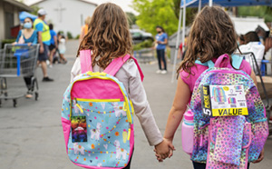 School girls with backpacks